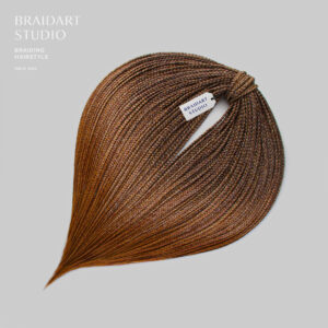 Де-косы из тёмно-русого в рыжеватые кончики.